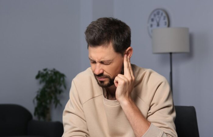 Swollen ear showing redness, swelling, and signs of infection