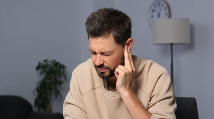 Swollen ear showing redness, swelling, and signs of infection