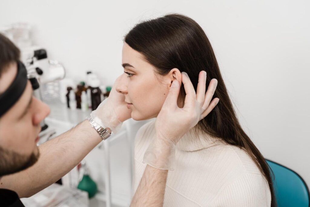 What are the Common Causes and Symptoms of a Swollen Ear